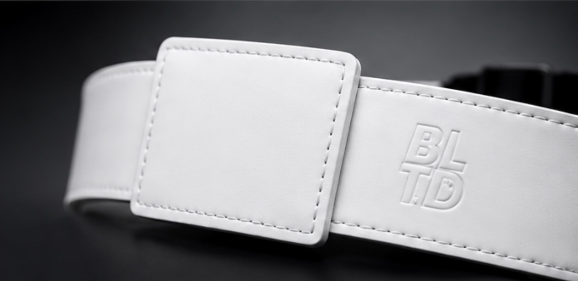 Studio close-up of the stitched BELTD patch and embossed BLTD mark